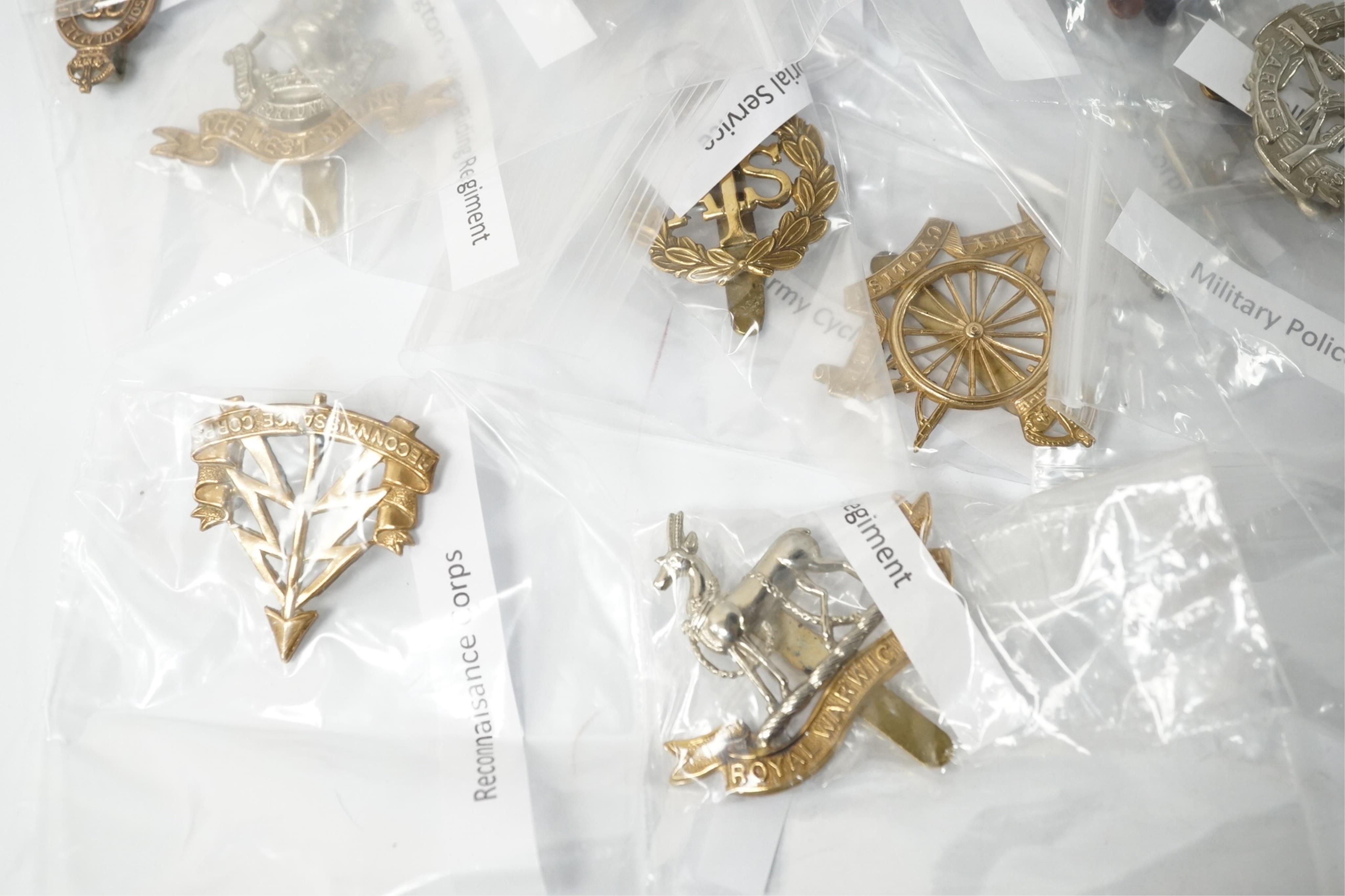 Fifty military cap badges, including; the Duke of Lancaster’s Own regiment, the Blues and Royals, Glider Pilot regiment, Sherwood Foresters regiment, Leicestershire regiment, Royal West Kent regiment, Inns of Court regim